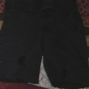 Black ripped shorts